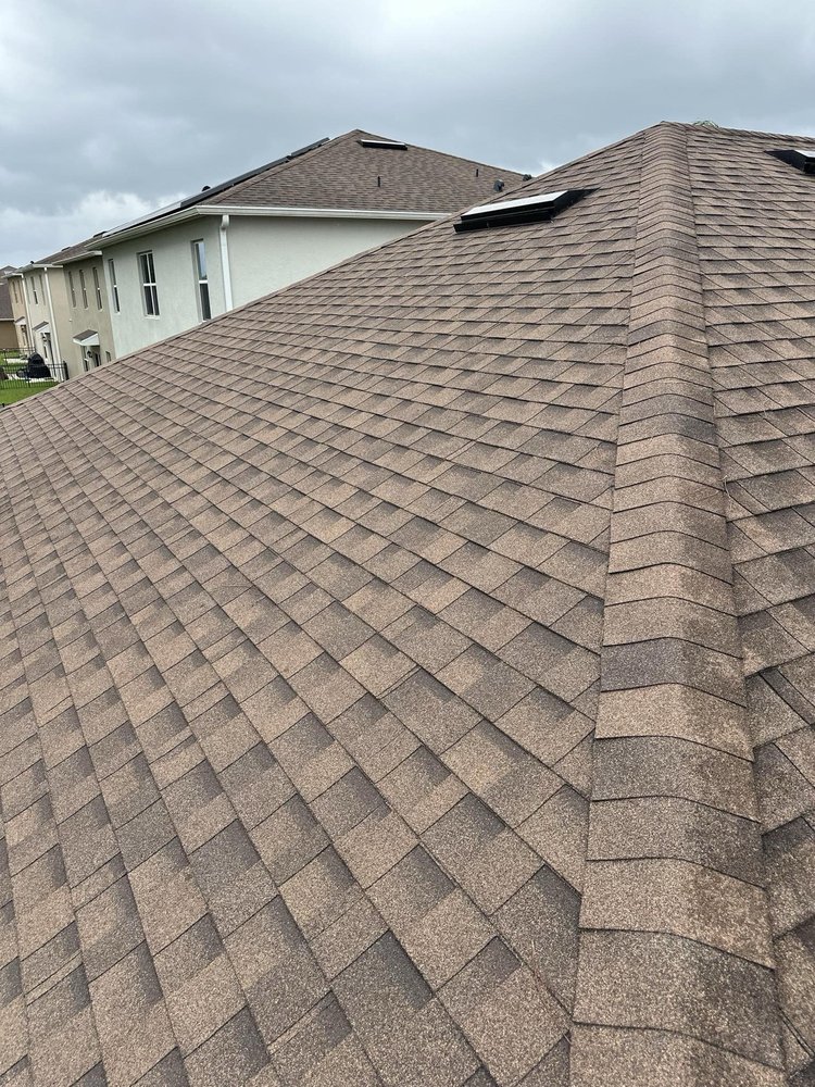 Slide of Janney Roofing