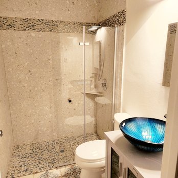 Coastal Region Construction - Unique spa-style bathroom with stone shower walls, mosaic tile, and vessel sink - Custom remodel project - General Contractors Near Me - West Sacramento, California Coastal Region Construction - Unique spa-style bathroom with stone shower walls, mosaic tile, and vessel sink - Custom remodel project - General Contractors Near Me - West Sacramento, California