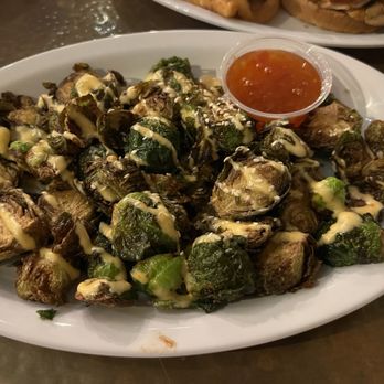Wooden Hill Brewing - Bang bang brussels ($11). Deep fried brussels sprouts, sesame seeds, bang bang drizzle, and Mae Ploy sweet chili sauce. - Breweries Near Me - Edina, Minnesota Wooden Hill Brewing - Bang bang brussels ($11). Deep fried brussels sprouts, sesame seeds, bang bang drizzle, and Mae Ploy sweet chili sauce. - Breweries Near Me - Edina, Minnesota