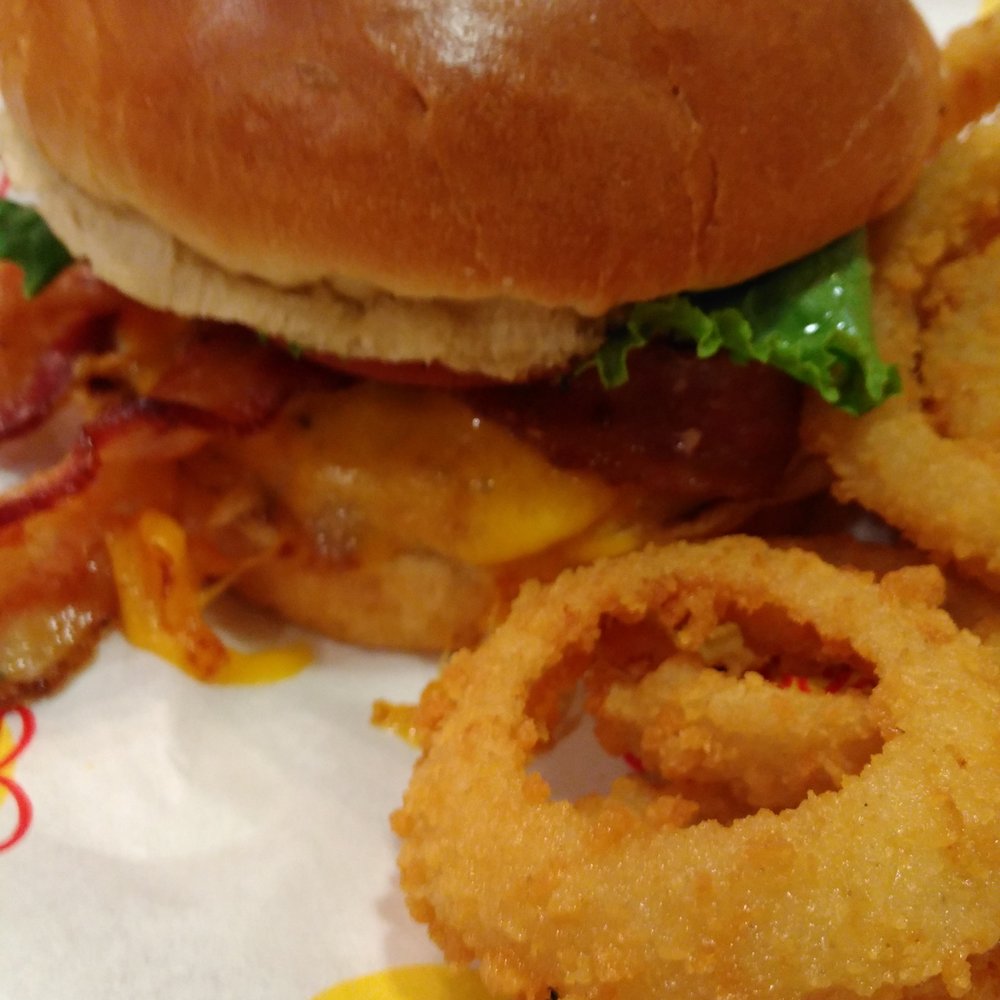 Johnny Rockets - Very good onion rings , bacon lettuce and tomato melted cheese all over and a juicy chicken breast - Diners Near Me - Reno, Nevada Johnny Rockets - Very good onion rings , bacon lettuce and tomato melted cheese all over and a juicy chicken breast - Diners Near Me - Reno, Nevada