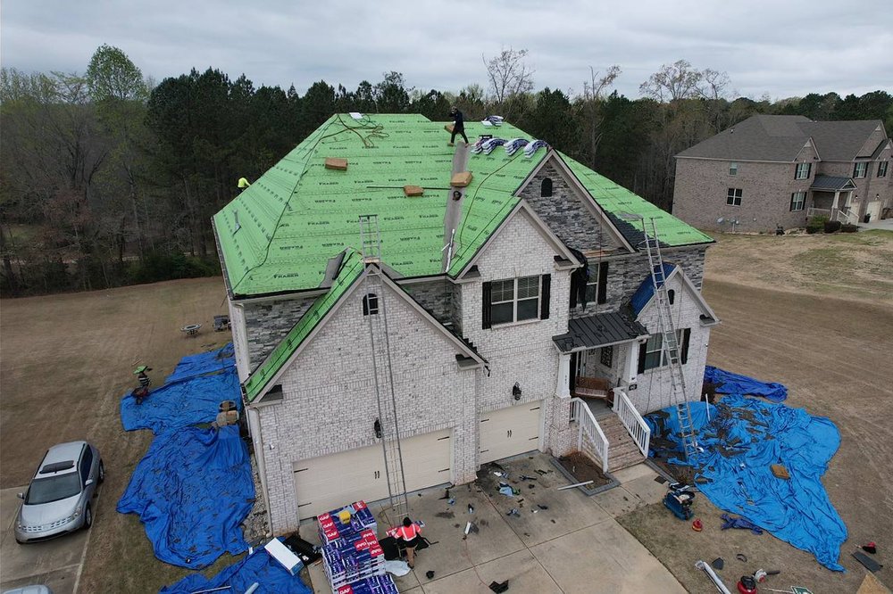 Slide of EXT Roofing Services