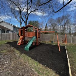 Goncalves Installations - Play set installation and mulch border