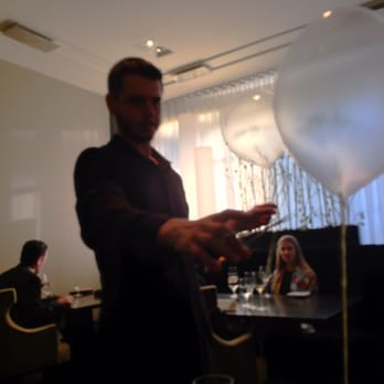 Alinea - Balloon: the ever-iconic dessert, featuring helium and green apple. So much fun! I hope this one stays for Alinea 2.0! - New American Near Me - Chicago, Illinois
