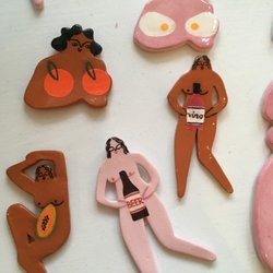 Glitter Box NO - These ceramic magnets would be better if the magnets on the back were larger! One slam of the fridge door would be the end for these gals!
