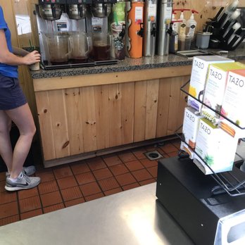 Starbucks - a woman standing in a coffee shop - Coffee & Tea Near Me - Elysburg, Pennsylvania