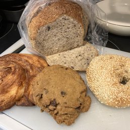 multigrain bread, cinnamon croissant, chocolate chip cookie, sesame bagel