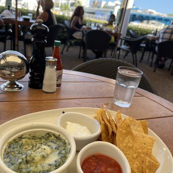 Houston's Restaurant - Spinach dip (maybe w/ provolone?) and perfect home-fried tortillas Simply far better than most other places. - American Near Me - Pompano Beach, Florida