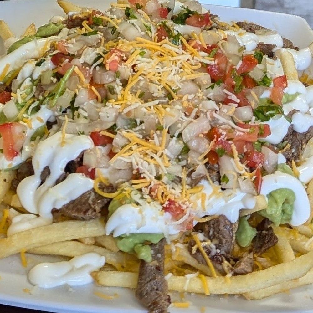 Carne asada fries - wish it was a bit more crisp and well done. Carne asada fries - wish it was a bit more crisp and well done.