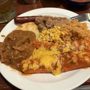 Nicha's Comida Mexicana - Plate 1 enchiladas, rice, beans, street corn, lil smoky sausage, quesadilla, carne guisada - Mexican Near Me - San Antonio, Texas