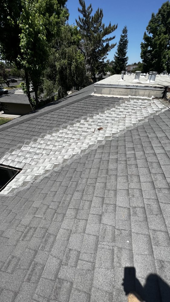 Slide of Bautista Roofing