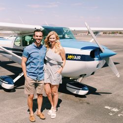 Joy Air Tours - We'll take some pictures of you with the airplane before you takeoff! Here's a couple getting ready for a romantic air tour for 2.