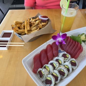 Fishermen's View - Tuna Sushi Boat, Mai Thai and a bucket of fries. - New American Near Me - Sandwich, Massachusetts Fishermen's View - Tuna Sushi Boat, Mai Thai and a bucket of fries. - New American Near Me - Sandwich, Massachusetts