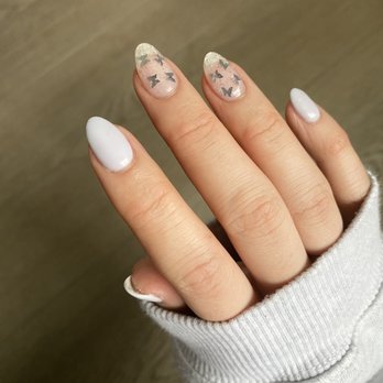 Crystal Nails & Spa - Lavender dip powder with gel sparkles and silver butterflies - Nail Salons Near Me - Everett, Washington Crystal Nails & Spa - Lavender dip powder with gel sparkles and silver butterflies - Nail Salons Near Me - Everett, Washington