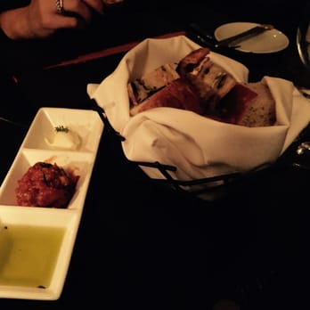 Scarpetta - House Made focaccia and pesto bread with dipping sauces - Italian Near Me - New York, New York