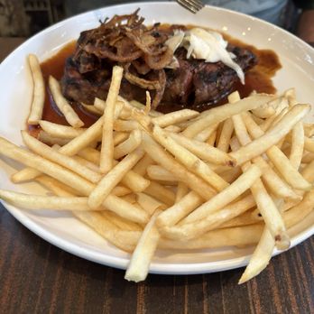 Taste Cafe & Bistro - Beef Filet Mignon Entrees onion and mushroom sauce, with French fries - Modern European Near Me - Pacific Grove, California Taste Cafe & Bistro - Beef Filet Mignon Entrees onion and mushroom sauce, with French fries - Modern European Near Me - Pacific Grove, California