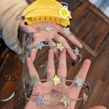 Bella Vita - Banana Hair Claw. $24. Fairytale Star Double Alice Headband. $18 each. - Children's Clothing Near Me - Oakland, California Bella Vita - Banana Hair Claw. $24. Fairytale Star Double Alice Headband. $18 each. - Children's Clothing Near Me - Oakland, California
