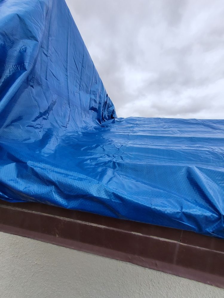 Slide of Red Rhino Roofing