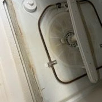 Cleaning by Jennie - This is the inside of the dishwasher before it was cleaned by "Cleaning by Jennie". - Home Cleaning Near Me