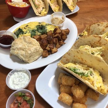 Ruby Sunshine Homewood - Front to back : tots and tacos, Florentine omelet, double cheese grits with breakfast tacos. - Breakfast & Brunch Near Me - Birmingham, Alabama Ruby Sunshine Homewood - Front to back : tots and tacos, Florentine omelet, double cheese grits with breakfast tacos. - Breakfast & Brunch Near Me - Birmingham, Alabama