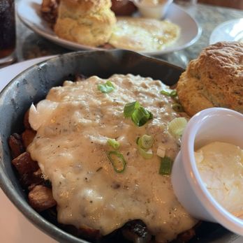 Sage Biscuit Cafe - Downtown - Sage Biscuit Skillet Onions, peppers, sausage, eggs and sausage gravy - Breakfast & Brunch Near Me - Bradenton, Florida Sage Biscuit Cafe - Downtown - Sage Biscuit Skillet Onions, peppers, sausage, eggs and sausage gravy - Breakfast & Brunch Near Me - Bradenton, Florida