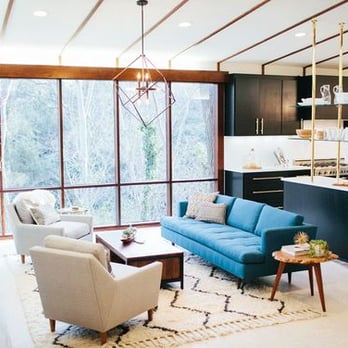 Nancy Gerber - Walls of glass and minimal furniture adorn this interior of a Mid Century - Real Estate Agents Near Me - Pasadena, California