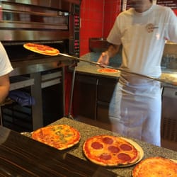 Colosseo Mini Pizza - Your pizza being made in front of you