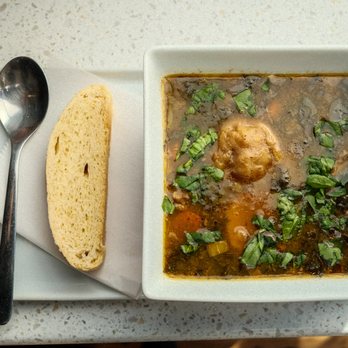 Kafe Louverture - Chicken Bouillon Soup
Chicken, plantain, yucca, white sweet potato, carrots, watercress, and spinach in chicken broth - Bakeries Near Me - Rocky Mount, North Carolina