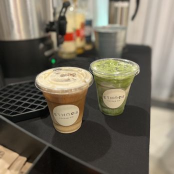 Ethnos Coffee - two cups of coffee on a table - Caterers Near Me