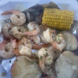 Shrimp Platter with sausage and taters corn setup.