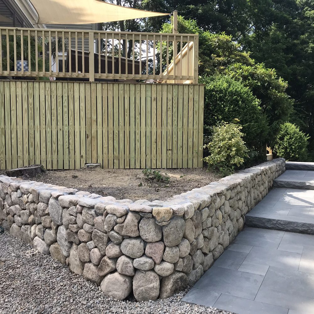 Cape Codder Home Improvement - Retaining rock wall - Masonry/Concrete Near Me - West Yarmouth, Massachusetts Cape Codder Home Improvement - Retaining rock wall - Masonry/Concrete Near Me - West Yarmouth, Massachusetts