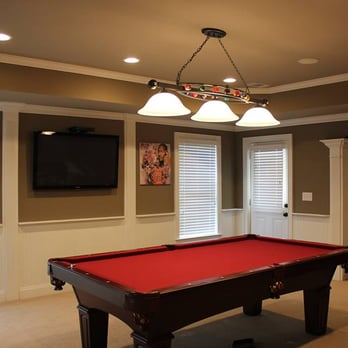 Morales Construction Group - a pool table in a living room - General Contractors Near Me Morales Construction Group - a pool table in a living room - General Contractors Near Me