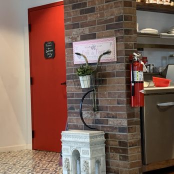Cafe de Paris - More adorable decorations and door to cute bathroom. - Coffee & Tea Near Me - North Myrtle Beach, South Carolina