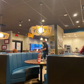 Denny's - Denny's restaurant with a employee in the photo. - Breakfast & Brunch Near Me - Bryant, Arkansas