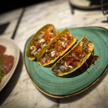 SEEN - Seen Tacos, with
fresh daily fish ceviche, guac, Japanese mayonnaise, Tobiko roe, sprouts, and pomegranate. - Portuguese Near Me - Lisbon, 11 SEEN - Seen Tacos, with
fresh daily fish ceviche, guac, Japanese mayonnaise, Tobiko roe, sprouts, and pomegranate. - Portuguese Near Me - Lisbon, 11