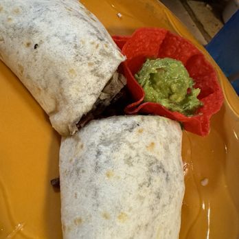 Burros Tex Mex Bar and Grill - Medium beef brisket wrapped burro with black beans and a side of guacamole - Cocktail Bars Near Me - Round Rock, Texas Burros Tex Mex Bar and Grill - Medium beef brisket wrapped burro with black beans and a side of guacamole - Cocktail Bars Near Me - Round Rock, Texas