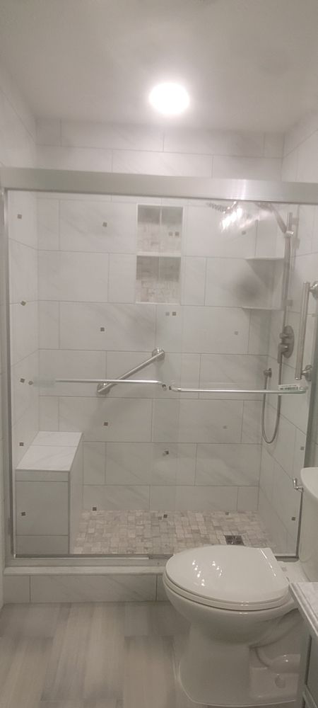 Slide of Prestige tile and bath