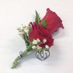 Flower Stop - Homecoming boutonnière with red spray roses, gypsophila and silver and black metallic wire accents.