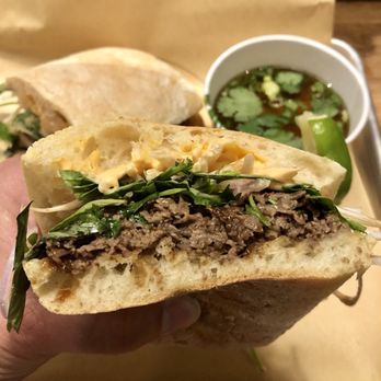 Lardo - Pho'rench Dip - shaved beef, hoisin' sambas mayo, thai basil, pho broth - Sandwiches Near Me - Las Vegas, Nevada Lardo - Pho'rench Dip - shaved beef, hoisin' sambas mayo, thai basil, pho broth - Sandwiches Near Me - Las Vegas, Nevada