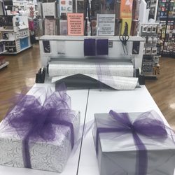 Bed Bath & Beyond - Now they have a DIY gift wrapping station.