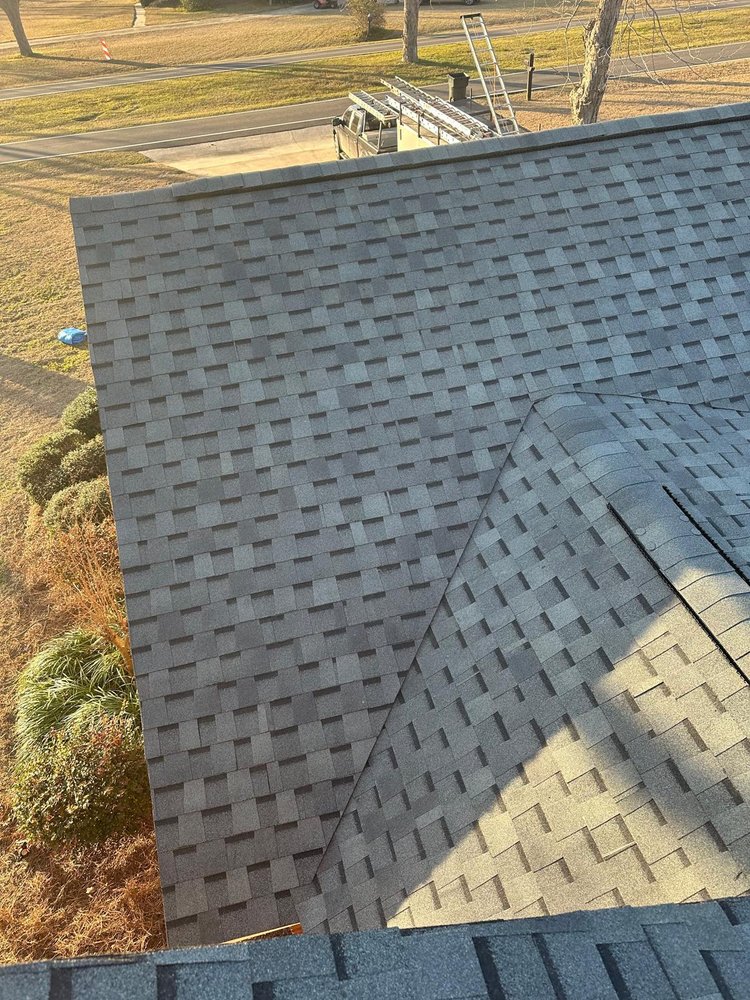 Slide of Palma's Roofing Experts