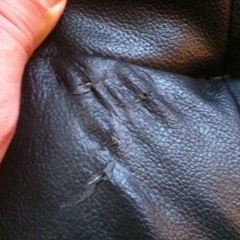 Caprices Furniture - This is the stress tear that appears in my new leather sofa 2 months after I bought it. Caprice did nothing about it. - Furniture Stores Near Me - Culver City, California