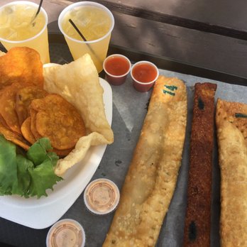 La Casa de los Pastelillos - Pastelillos de pollo y langosta, alcapurria de juey (crab), bacalaitos, and jugo de parcha (passion fruit juice) with run. Yum!! - Seafood Near Me - Guayama, Puerto Rico