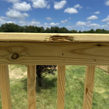 B&T Deck Remolding - This is brand new railing. This wood has chunks missing out of it and I have already gotten splinters from it - Decks & Railing Near Me
