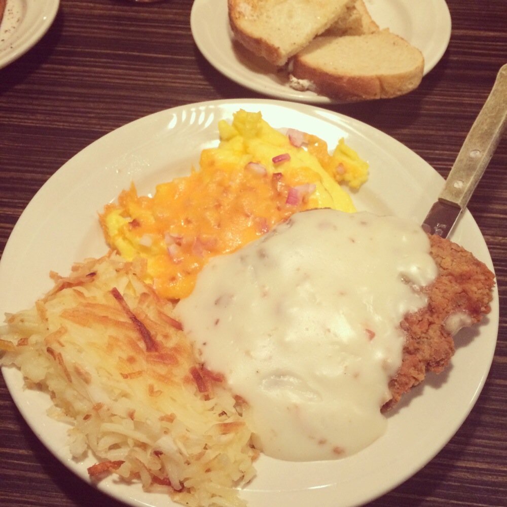 Café Milano - Chicken Fried Steak with cheese onion eggs. $9.95 (I added the cheese and onions) - Cafes Near Me - West Wendover, Nevada Café Milano - Chicken Fried Steak with cheese onion eggs. $9.95 (I added the cheese and onions) - Cafes Near Me - West Wendover, Nevada