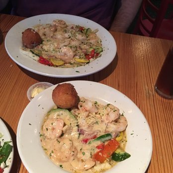 Jonah's Fish & Grits - Shrimp and grits large portion and small portion (bottom) - Seafood Near Me - Thomasville, Georgia Jonah's Fish & Grits - Shrimp and grits large portion and small portion (bottom) - Seafood Near Me - Thomasville, Georgia