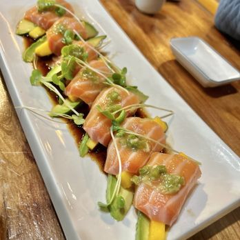 Mika Sushi - Sake Wrap Carpaccio - mango, avocado, wrapped in the freshest salmon! - Sushi Bars Near Me - Carmel valley, California Mika Sushi - Sake Wrap Carpaccio - mango, avocado, wrapped in the freshest salmon! - Sushi Bars Near Me - Carmel valley, California