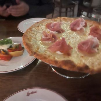 Luchini Italian Restaurant - Fuhgeddaboutit pizza and heirloom tomato burrata salad - Italian Near Me - Las Vegas, Nevada