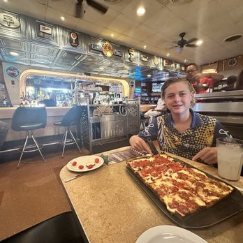 Buddy's Pizza - The Meat half is the far side and the near side the Detroiter. - Pizza Near Me - Detroit, Michigan