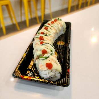 Sushi Don - West Lafayette - a sushi roll on a black plate - Sushi Bars Near Me - West Lafayette, Indiana Sushi Don - West Lafayette - a sushi roll on a black plate - Sushi Bars Near Me - West Lafayette, Indiana