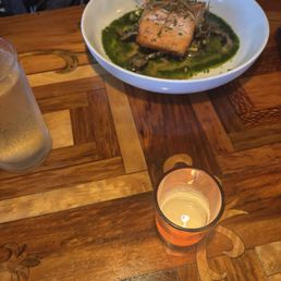Salmon on something green . Seafood Gumbo Entree TG Salmon on something green . Seafood Gumbo Entree TG